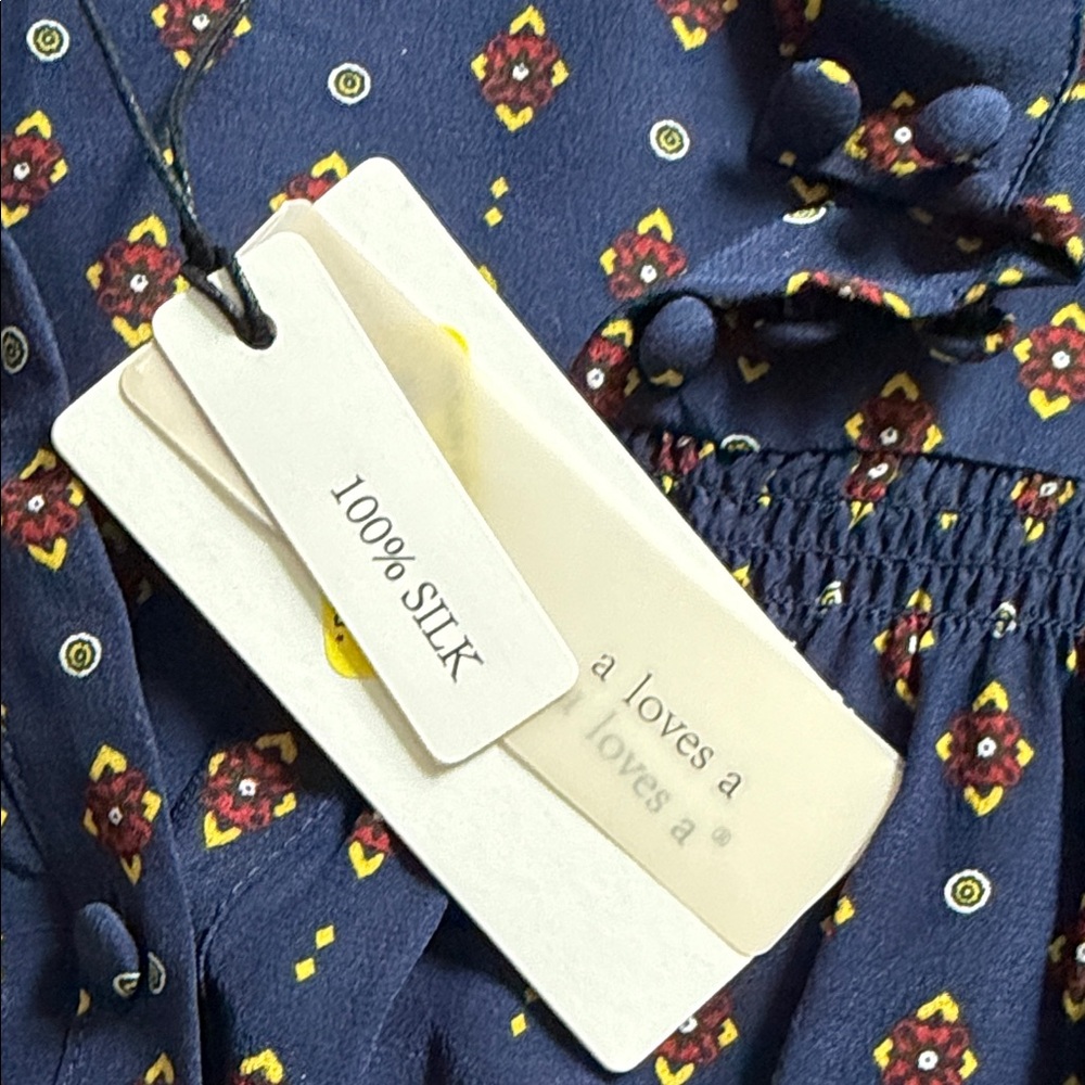 100% silk Size small. NWT. Elegant Navy Floral Women's Blouse
